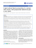 Báo cáo y học: "A giant adrenal lipoma presenting in a woman with chronic mild postprandial abdominal pain: a case report"