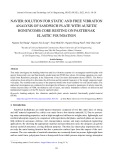 Navier solution for static and free vibration analysis of sandwich plate with auxetic honeycomb core resting on pasternak elastic foundation