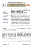 Nonlinear buckling and postbuckling of spiral stiffened FG-GPLRC cylindrical shells subjected to torsional loads